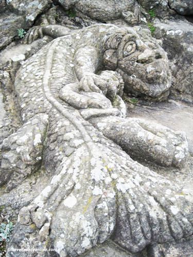 Rotheneuf Carved Rocks - The sea monster holding the last of the Rotheneuf in his sharp claws