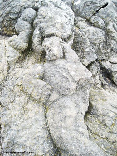 Rotheneuf Carved Rocks - The sea monster devouring the last of the Rotheneuf