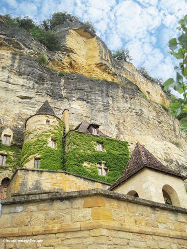 Manoir de la Tarde built against the rock face in La Roque Gageac