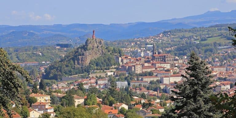 Notre-Dame de France statue stands the Rocher Corneille and dominates Le Puy en Velay city